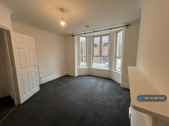Bedroom With Large Bay Window