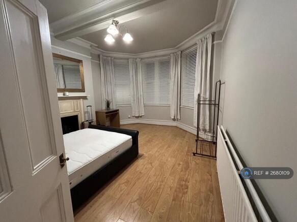 Living Room/ Currently Used As a Second Bedroom