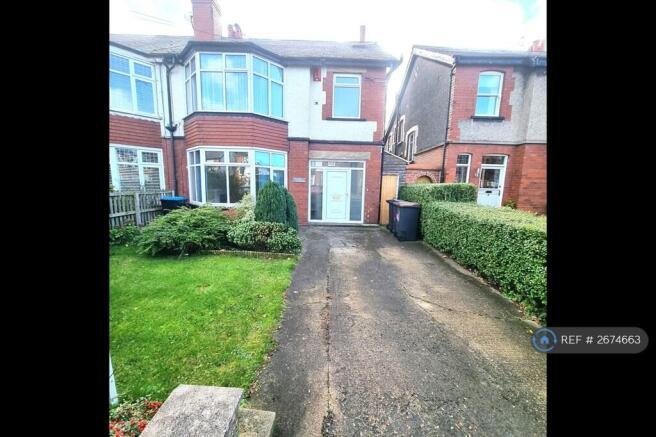 Front Of House With Parking 