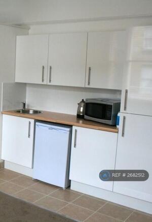 Kitchen With Basic Facilities.