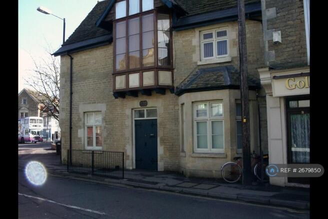Blue  Door Leading To Flat Two And Three 
