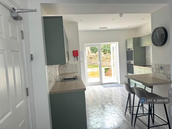 Kitchen With Doors To Garden