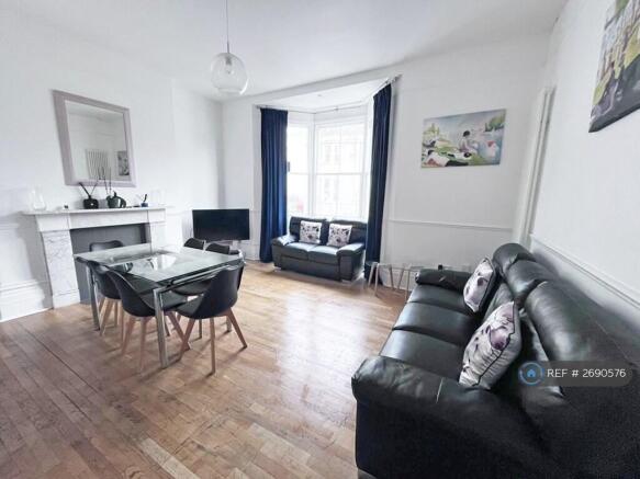 Living Room: Dining Seating For 8, 2 Large Sofas