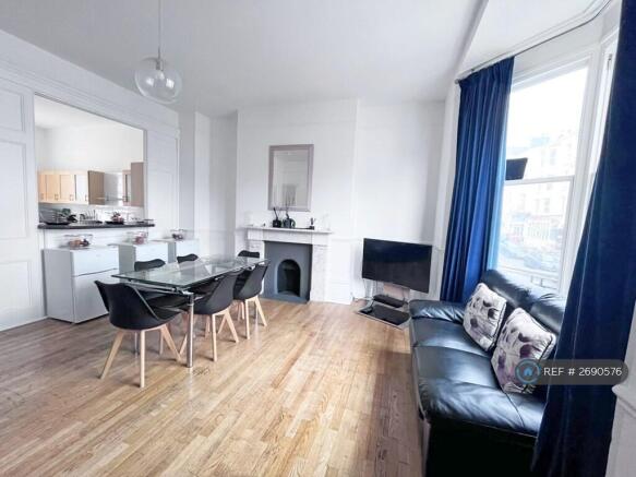 Living Room: Dining Seating For 8, 2 Large Sofas