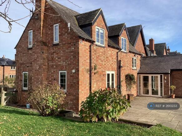 Side Of House From The Garden