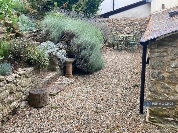 Gravel Patio Area To Rear