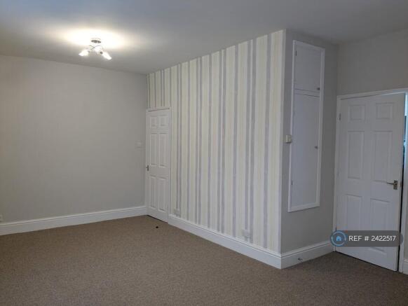 Lounge Showing Entry And Kitchen Door