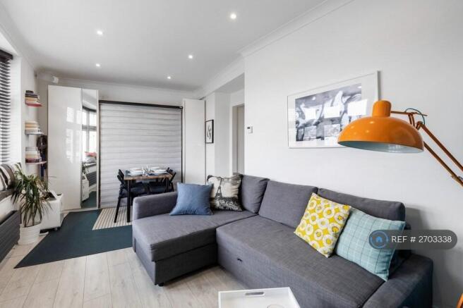 Studio - Living & Dining Area (Bed Up)