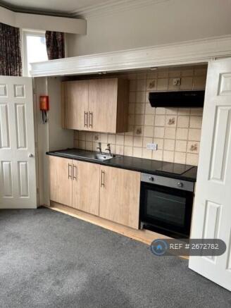 Kitchen Area With Doors To Hide