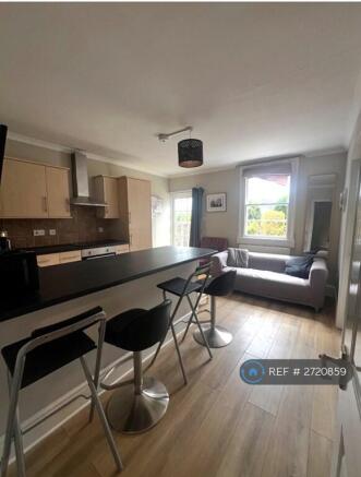 Open Plan Living Room Opens Onto The Garden