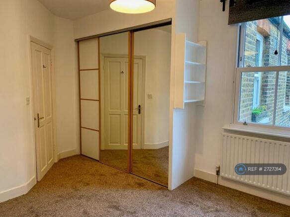 1st Bedroom With Fitted Wardrobes