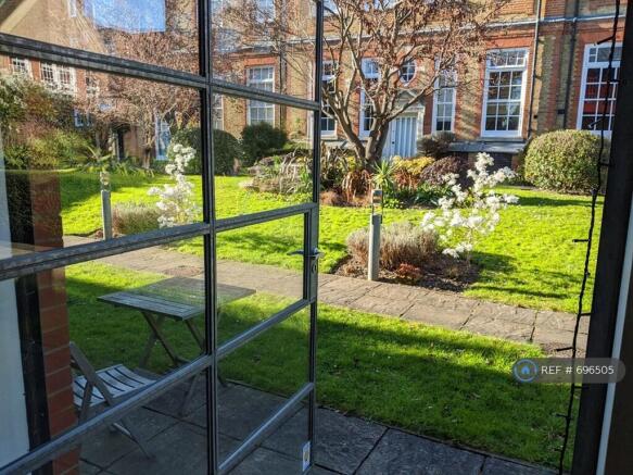 Kitchen Door Opens On To The Gardens