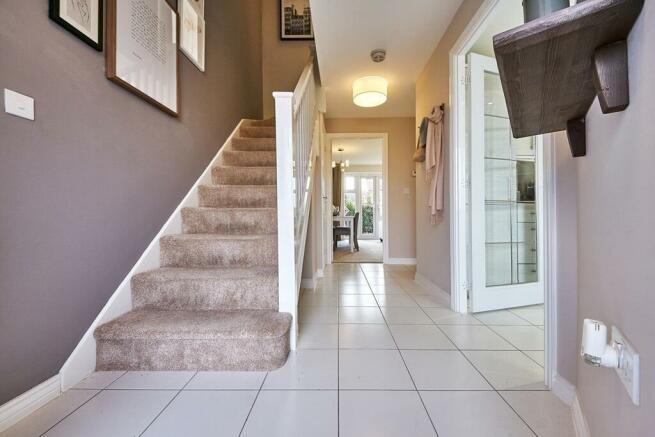 The Flatford has a spacious hallway with under stair storage