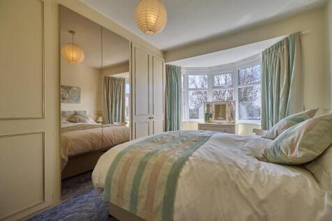 BEDROOM ONE TO FRONT
