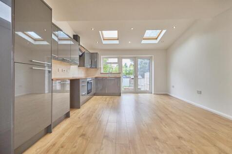 Open plan refitted living dining kitchen