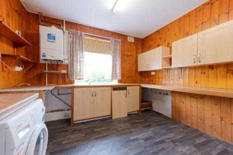 SITTING ROOM AND DINING KITCHEN