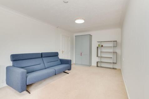 LARGER THAN AVERAGE SITTING AND DINING ROOM