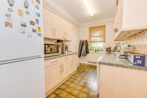 KITCHEN, UTILITY ROOM, DINER AND LIVING ROOM