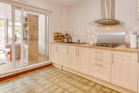 KITCHEN, UTILITY ROOM, DINER AND LIVING ROOM