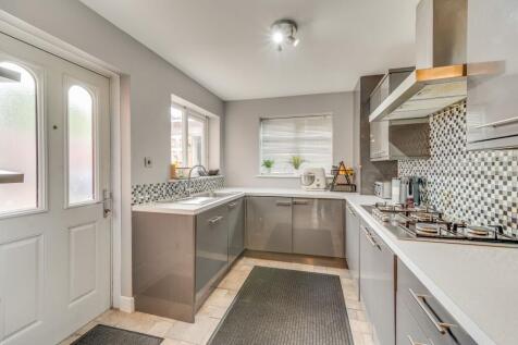 LIVING ROOM, KITCHEN AND DINING ROOMS