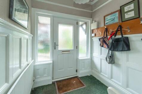 ENTRANCE HALLWAY AND LANDING