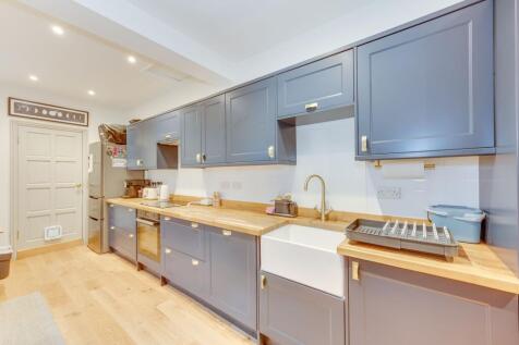 DINER OPENING TO EXTENDED FITTED KITCHEN