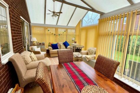 L-SHAPED CONSERVATORY