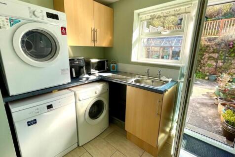 REAR PORCH/ UTILITY ROOM
