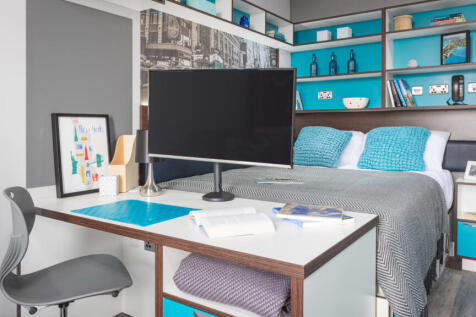 Bedroom with large flat screen TV