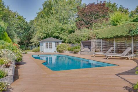 View across the Pool to the Garden Store