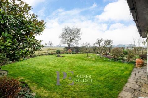 To the rear of the Property