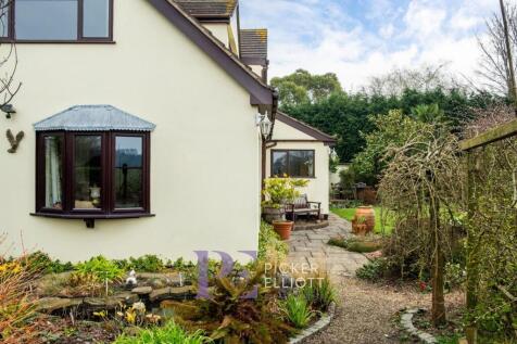 To the rear of the Property