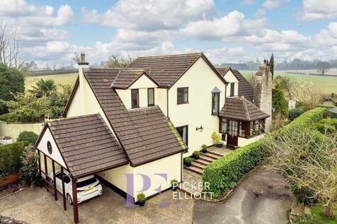 To the front of the Property