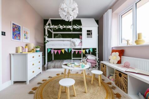 A second double bedroom overlooks the rear garden