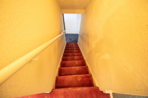 Stairwell to the Upper Floor