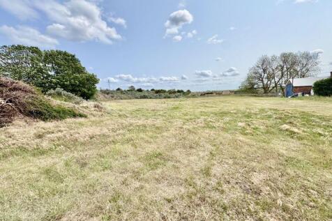 Coastal land to rear