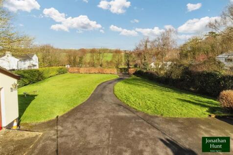 DRIVEWAY AND FRONT ASPECT