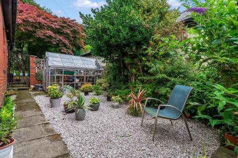 Greenhouse and Side Garden