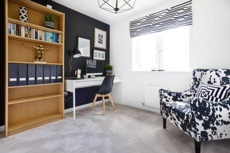 Bedroom 5 offers the perfect study space or game room