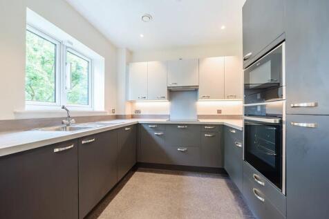Kitchen with built-in appliances