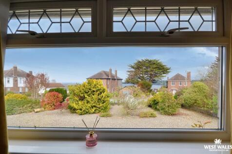 Partial Views of Sea to Front