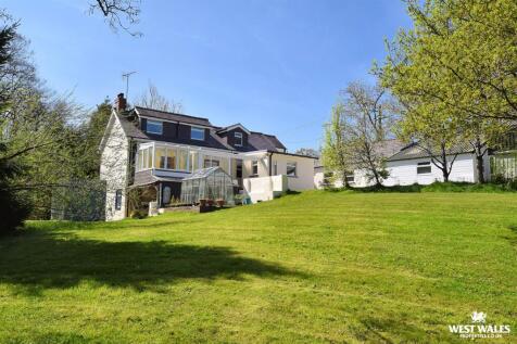 View from Stream of Grounds + House