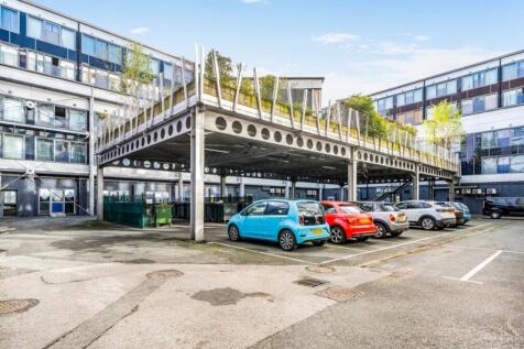 Raised communal garden and contract parking