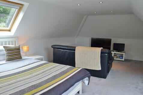 Bedroom 4 and seating area