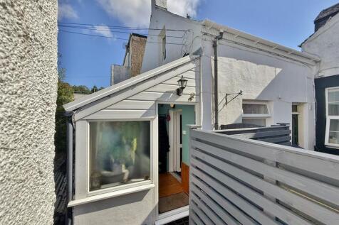 Sun room entrance from the lane
