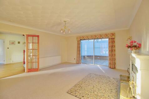 Double doors from main hall to living room