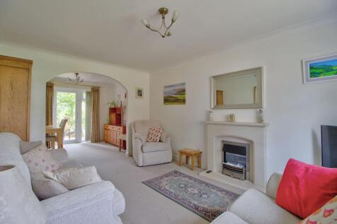 Living room with stone fireplace