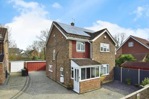 Outside View Of The Property With Driveway Parking &amp; Garage View
