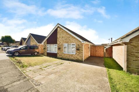 Outside View Of The Property With Driveway Parking