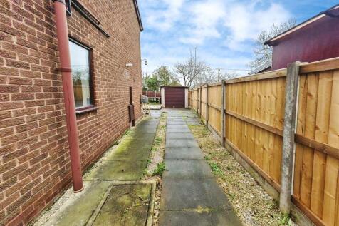 Driveway leading to Garage